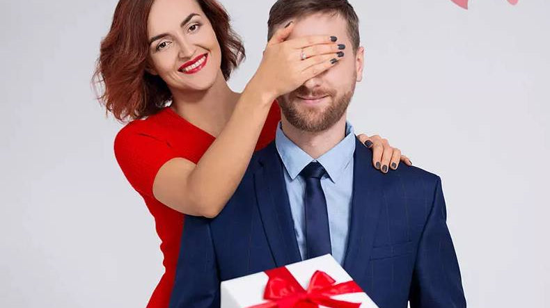 Bearded man receiving gift